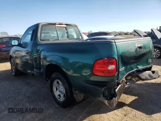 1999 Ford F-150 XL with VIN 2FTZF0720XCA14612, listed as a Copart auction lot 75092304 with 230,897 mi miles and Salvage Title. Bid and sale history available at carsss.com. Image 2.