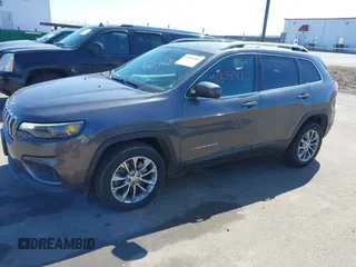 2019 Jeep Cherokee Latitude Plus with VIN 1C4PJLLB1KD201847, listed as a IAAI auction lot 41814463 with 115,927 mi miles. Bid and sale history available at carsss.com. Image 17.