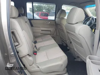 2009 Honda Pilot EX with VIN 5FNYF48499B016714, listed as a IAAI auction lot 41860249 with 143,353 mi miles and . Bid and sale history available at DreamBid. Image 8.