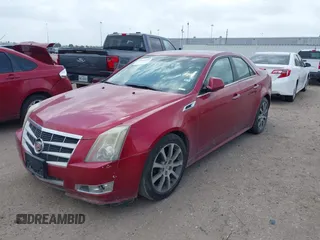 2011 Cadillac CTS with VIN 1G6D25EY3B0133526, listed as a IAAI auction lot 41923952 with 162,785 mi miles and . Bid and sale history available at DreamBid. Image 2.