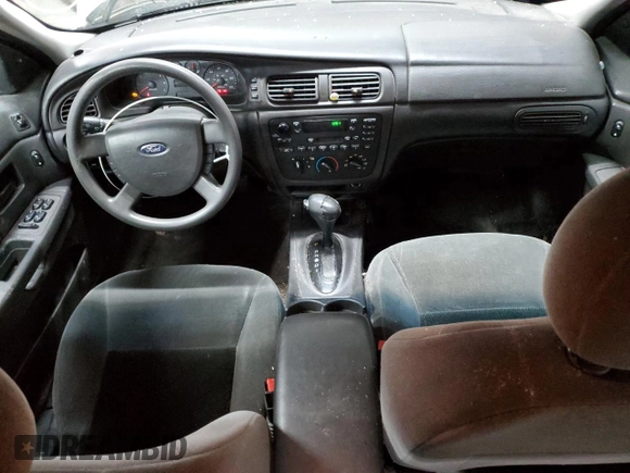 2004 Ford Taurus SE with VIN 1FAFP53224G175353, listed as a Copart auction lot 52713935 with 213,375 mi miles and Salvage Title. Bid and sale history available at DreamBid. Image 8.