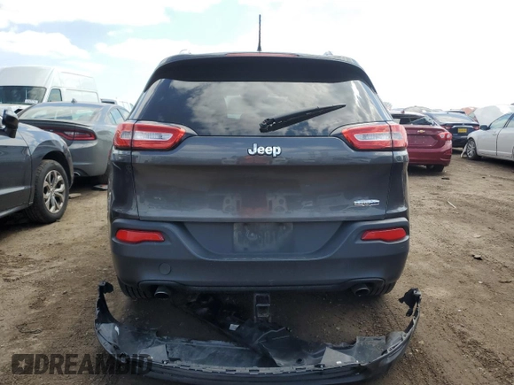 2014 Jeep Cherokee Latitude z VIN 1C4PJLCS5EW148272, wystawiony jako Copart lot #52852295 z przebiegiem 99 591 mil mil oraz Szkoda całkowita • Salvage title. Historia ofert i sprzedaży dostępna na DreamBid. Obrazek 6.