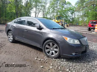 2012 Buick LaCrosse Premium 3 z VIN 1G4GH5E31CF310937, wystawiony jako IAAI lot #42092530 z przebiegiem 165 295 mil mil oraz . Historia ofert i sprzedaży dostępna na DreamBid. Obrazek 1.