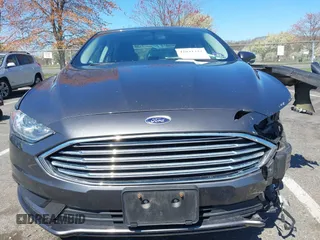2017 Ford Fusion SE with VIN 3FA6P0H70HR107252, listed as a IAAI auction lot 42041332 with 121,255 mi miles. Bid and sale history available at carsss.com. Image 6.