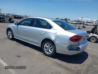 2017 Volkswagen Passat S with VIN 1VWAT7A32HC009657, listed as a IAAI auction lot 42541472 with 100,026 mi miles and . Bid and sale history available at DreamBid. Image 3.