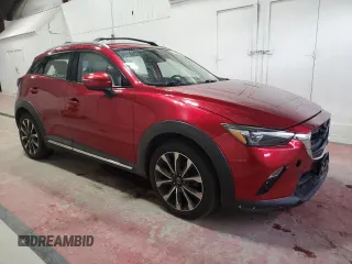 2019 Mazda CX-3 Grand Touring with VIN JM1DKFD77K0423490, listed as a Copart auction lot 76463324 with 88,031 mi miles and Salvage Title. Bid and sale history available at DreamBid. Image 4.