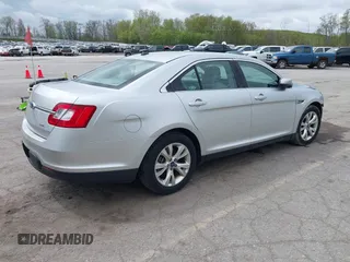 2012 Ford Taurus SEL z VIN 1FAHP2EW1CG134363, wystawiony jako IAAI lot #42180692 z przebiegiem 163 193 mil mil oraz . Historia ofert i sprzedaży dostępna na DreamBid. Obrazek 4.
