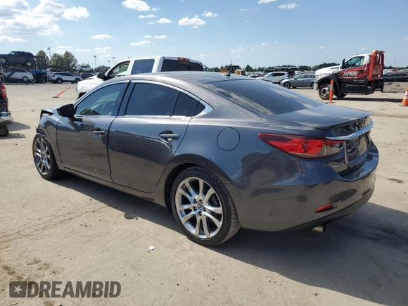 2014 Mazda 6 i Grand Touring с VIN JM1GJ1W67E1135264, выставлен на аукционе Copart как лот 70587624 с пробегом 86 926 миль миль и Списание • Salvage title. История ставок и продаж доступна на DreamBid. Изображение 2.