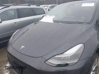 2024 Tesla Model Y Long Range with VIN 7SAYGDEE3RA239499, listed as a IAAI auction lot 41632887 with Not Provided miles. Bid and sale history available at carsss.com. Image 10.