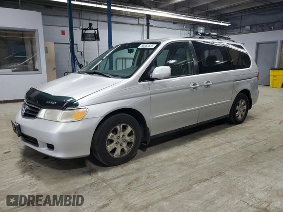 2002 Honda Odyssey EX with VIN 2HKRL18642H578718, listed as a Copart auction lot 59052525 with 170,928 mi miles and Salvage title. Bid and sale history available at DreamBid. Image 1.