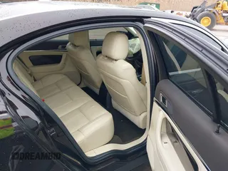 2014 Lincoln MKS with VIN 1LNHL9EK7EG609329, listed as a IAAI auction lot 41555819 with 89,849 mi miles. Bid and sale history available at carsss.com. Image 8.