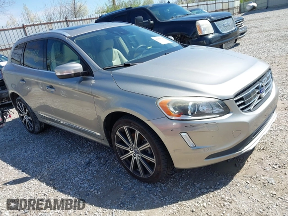 2016 Volvo XC60 T6 Drive-E Platinum z VIN YV449MDMXG2867316, wystawiony jako IAAI lot #41954778 z przebiegiem 97 586 mil mil oraz . Historia ofert i sprzedaży dostępna na DreamBid. Obrazek 1.