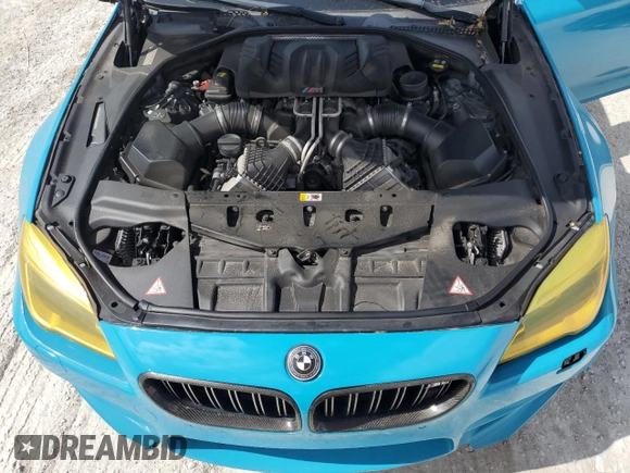 2016 BMW M6 z VIN WBS6E9C51GG437085, wystawiony jako Copart lot #78982124 z przebiegiem Nie podano mil oraz Szkody całkowita. Historia ofert i sprzedaży dostępna na DreamBid. Obrazek 11.