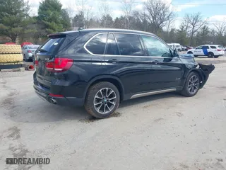 2017 BMW X5 xDrive35i with VIN 5UXKR0C36H0V77999, listed as a IAAI auction lot 41867766 with 98,222 mi miles. Bid and sale history available at carsss.com. Image 4.