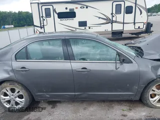 2012 Ford Fusion SE with VIN 3FAHP0HA8CR392716, listed as a IAAI auction lot 42371371 with 160,513 mi miles and . Bid and sale history available at DreamBid. Image 12.