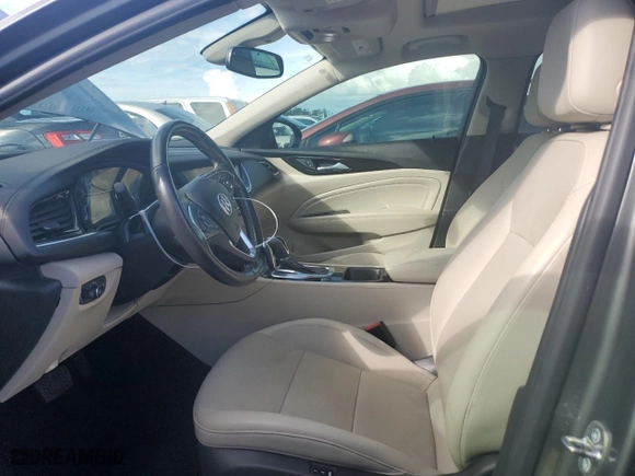 2019 Buick Regal TourX Essence with VIN W04GV8SX0K1013461, listed as a Copart auction lot 77276214 with NaN miles and Salvage Title. Bid and sale history available at carsss.com. Image 7.