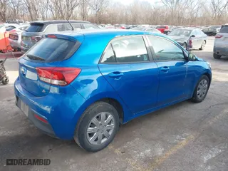 2021 Kia Rio 5-Door S with VIN 3KPA25AD9ME379848, listed as a IAAI auction lot 41335052 with 52,917 mi miles. Bid and sale history available at carsss.com. Image 4.