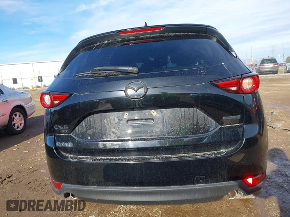 2021 Mazda CX-5 Grand Touring with VIN JM3KFBDM0M1357587, listed as a IAAI auction lot 41680245 with 1 mi miles. Bid and sale history available at carsss.com. Image 16.
