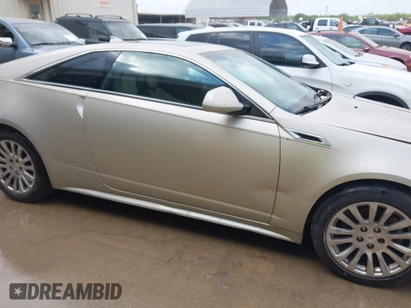 2013 Cadillac CTS Coupe Premium with VIN 1G6DS1E36D0107566, listed as a IAAI auction lot 42079197 with 122,386 mi miles. Bid and sale history available at carsss.com. Image 13.