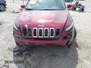 2014 Jeep Cherokee Latitude with VIN 1C4PJLCS3EW143362, listed as a IAAI auction lot 42150037 with 86,012 mi miles. Bid and sale history available at carsss.com. Image 12.
