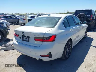 2019 BMW 3 Series 330i with VIN WBA5R1C58KAK07061, listed as a IAAI auction lot 41843706 with 57,930 mi miles and . Bid and sale history available at DreamBid. Image 4.