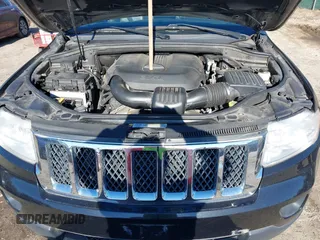 2011 Jeep Grand Cherokee Overland with VIN 1J4RS6GGXBC659349, listed as a IAAI auction lot 41778399 with 219,624 mi miles and . Bid and sale history available at DreamBid. Image 10.