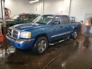 2006 Dodge Dakota Laramie with VIN 1D7HW58N46S589233, listed as a Copart auction lot 87595395 with 257,444 mi miles and Salvage Title. Bid and sale history available at carsss.com. Image 1.