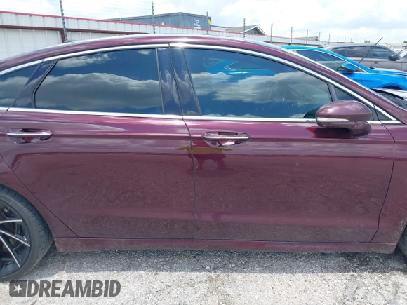 2018 Ford Fusion Titanium with VIN 3FA6P0K92JR114283, listed as a IAAI auction lot 42704476 with 92,502 mi miles and . Bid and sale history available at DreamBid. Image 13.
