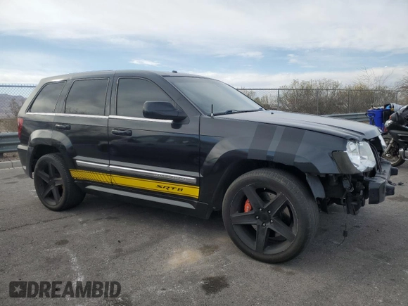 2008 Jeep Grand Cherokee SRT-8 with VIN 1J8HR78398C214004, listed as a Copart auction lot 48760375 with 165,318 mi miles and Salvage Title. Bid and sale history available at carsss.com. Image 4.