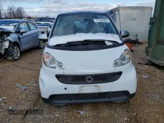 2015 Smart fortwo Passion z VIN WMEEJ3BA8FK790317, wystawiony jako Copart lot #71124392 z przebiegiem Nie podano mil oraz Szkody całkowita. Historia ofert i sprzedaży dostępna na DreamBid. Obrazek 5.