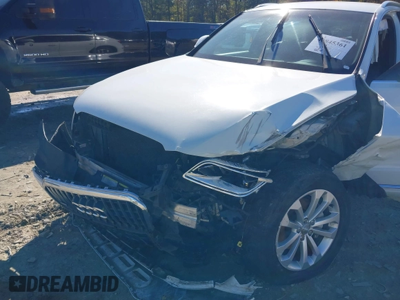 2014 Audi Q5 Premium z VIN WA1CFAFP0EA061818, wystawiony jako IAAI lot #40845361 z przebiegiem 166 333 mil mil oraz . Historia ofert i sprzedaży dostępna na DreamBid. Obrazek 6.