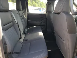 2023 Nissan Frontier Pro-4X z VIN 1N6ED1EK8PN674868, wystawiony jako Copart lot #50262715 z przebiegiem 13 545 mil mil oraz Szkoda całkowita • Salvage title. Historia ofert i sprzedaży dostępna na DreamBid. Obrazek 10.