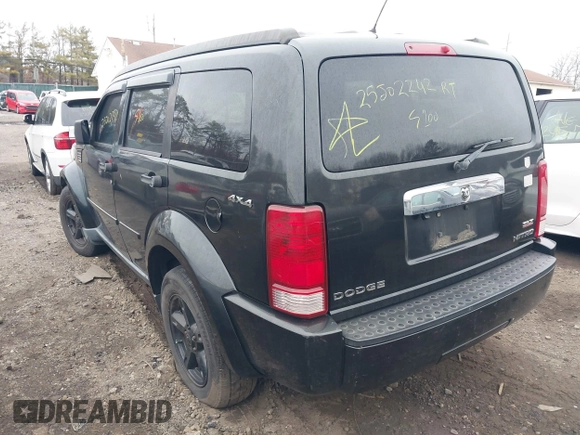 2009 Dodge Nitro SLT with VIN 1D8GU58K19W525618, listed as a IAAI auction lot 41726192 with 999,999 mi miles. Bid and sale history available at carsss.com. Image 3.