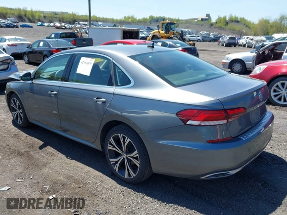 2021 Volkswagen Passat SE with VIN 1VWSA7A39MC011507, listed as a IAAI auction lot 42160879 with 82,639 mi miles and . Bid and sale history available at DreamBid. Image 3.