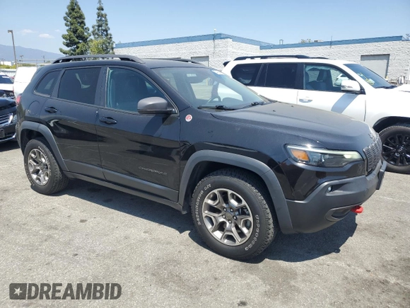 2021 Jeep Cherokee Trailhawk with VIN 1C4PJMBX8MD167153, listed as a Copart auction lot 54929845 with 52,800 mi miles and Clean title. Bid and sale history available at DreamBid. Image 4.