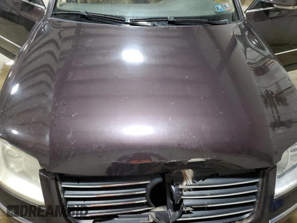 2004 Volkswagen Passat GLS z VIN WVWPD63B24P158792, wystawiony jako Copart lot #53449945 z przebiegiem 90 749 mil mil oraz Szkoda całkowita • Salvage title. Historia ofert i sprzedaży dostępna na DreamBid. Obrazek 11.