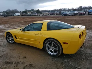 2004 Chevrolet Corvette with VIN 1G1YY22G645102213, listed as a Copart auction lot 84958784 with 77,338 mi miles and Salvage Title. Bid and sale history available at carsss.com. Image 2.
