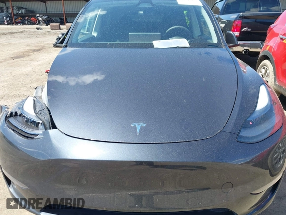 2024 Tesla Model Y Long Range with VIN 7SAYGAEE4RF078906, listed as a IAAI auction lot 42051207 with Not Provided miles and . Bid and sale history available at DreamBid. Image 10.