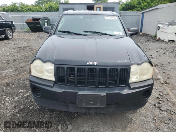 2007 Jeep Grand Cherokee Laredo z VIN 1J8GR48K47C681735, wystawiony jako Copart lot #59006435 z przebiegiem 195 517 mil mil oraz Nie do naprawy • Non repairable. Historia ofert i sprzedaży dostępna na DreamBid. Obrazek 5.