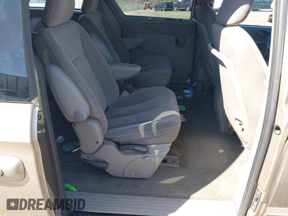 2002 Chrysler Town & Country EX with VIN 2C8GP74LX2R573857, listed as a IAAI auction lot 41846302 with Not Provided miles and . Bid and sale history available at carsss.com. Image 8.