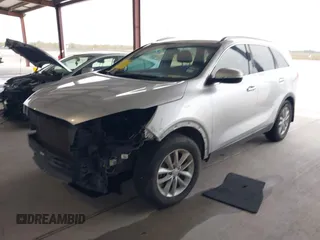 2018 Kia Sorento LX with VIN 5XYPG4A55JG360565, listed as a IAAI auction lot 41031059 with 138,963 mi miles and . Bid and sale history available at DreamBid. Image 2.