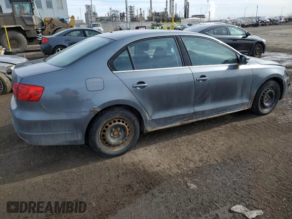 2013 Volkswagen Jetta with VIN 3VWWL7AJ6DM427118, listed as a Copart auction lot 50937335 with 337,598 mi miles and Salvage title. Bid and sale history available at DreamBid. Image 3.