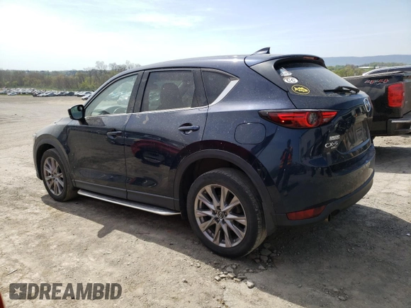 2020 Mazda CX-5 Grand Touring with VIN JM3KFBDM0L0767634, listed as a Copart auction lot 54433935 with 57,901 mi miles and Salvage Title. Bid and sale history available at carsss.com. Image 2.