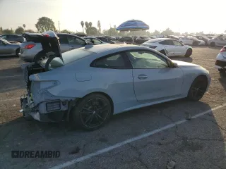 2022 BMW 4 Series 430i xDrive with VIN WBA73AP02NCK63692, listed as a Copart auction lot 84758794 with 21,484 mi miles and Salvage Title. Bid and sale history available at DreamBid. Image 3.