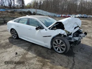 2019 Jaguar XJ with VIN SAJWJ1CD5K8W19663, listed as a Copart auction lot 51071665 with 28,468 mi miles and Salvage Title. Bid and sale history available at carsss.com. Image 4.