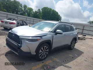 2023 Toyota Corolla Cross XLE with VIN 7MUDAAAG0PV057750, listed as a IAAI auction lot 42302284 with 31,404 mi miles and . Bid and sale history available at DreamBid. Image 17.