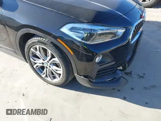 2019 BMW X2 sDrive28i with VIN WBXYJ3C50KEP77327, listed as a IAAI auction lot 40922194 with 94,672 mi miles. Bid and sale history available at carsss.com. Image 21.