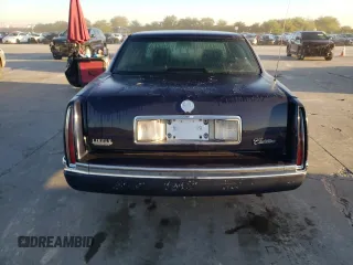 1994 Cadillac DeVille z VIN 1G6KD52B3RU283575, wystawiony jako Copart lot #73576044 z przebiegiem 133 977 mil mil oraz Czysty tytuł • Clean title. Historia ofert i sprzedaży dostępna na DreamBid. Obrazek 6.