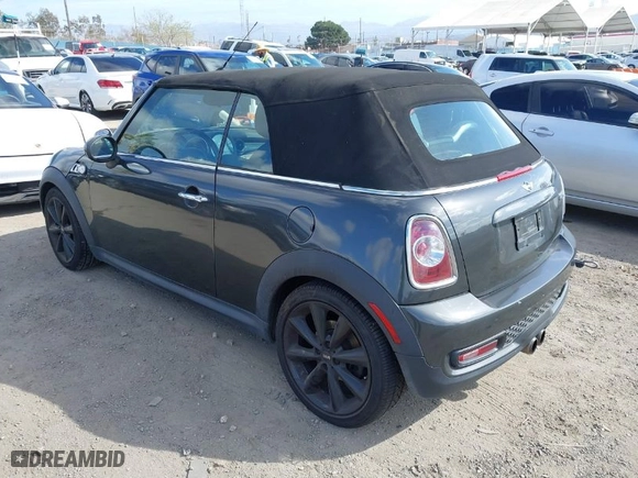 2011 MINI Cooper Convertible s with VIN WMWZP3C56BTX82699, listed as a IAAI auction lot 41723793 with 110,135 mi miles. Bid and sale history available at carsss.com. Image 3.
