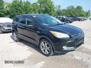 2013 Ford Escape SEL with VIN 1FMCU0H91DUB30514, listed as a IAAI auction lot 42719967 with 113,495 mi miles and . Bid and sale history available at DreamBid. Image 1.